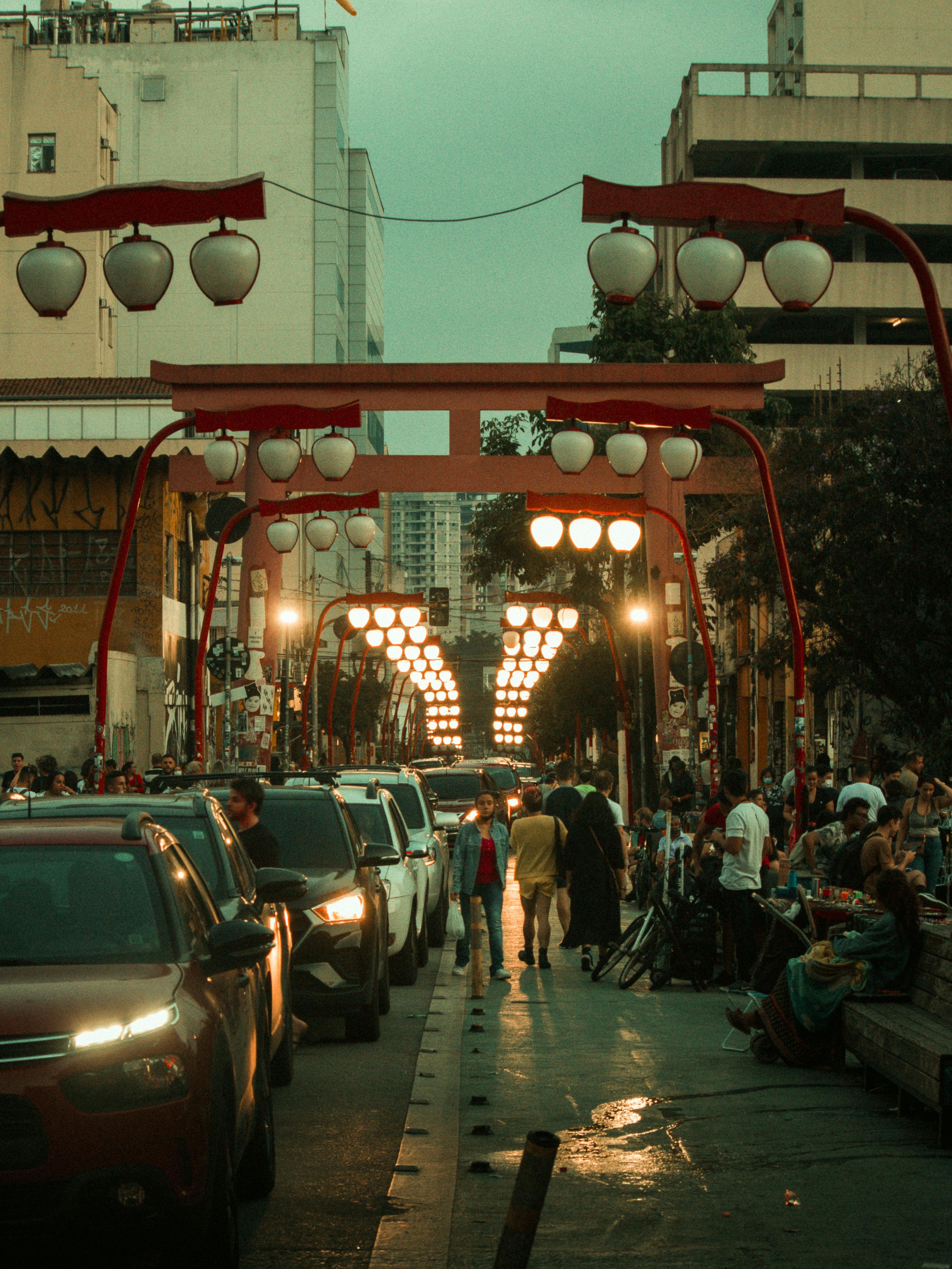 Decorative red lantern and busy street in the Liberdade district